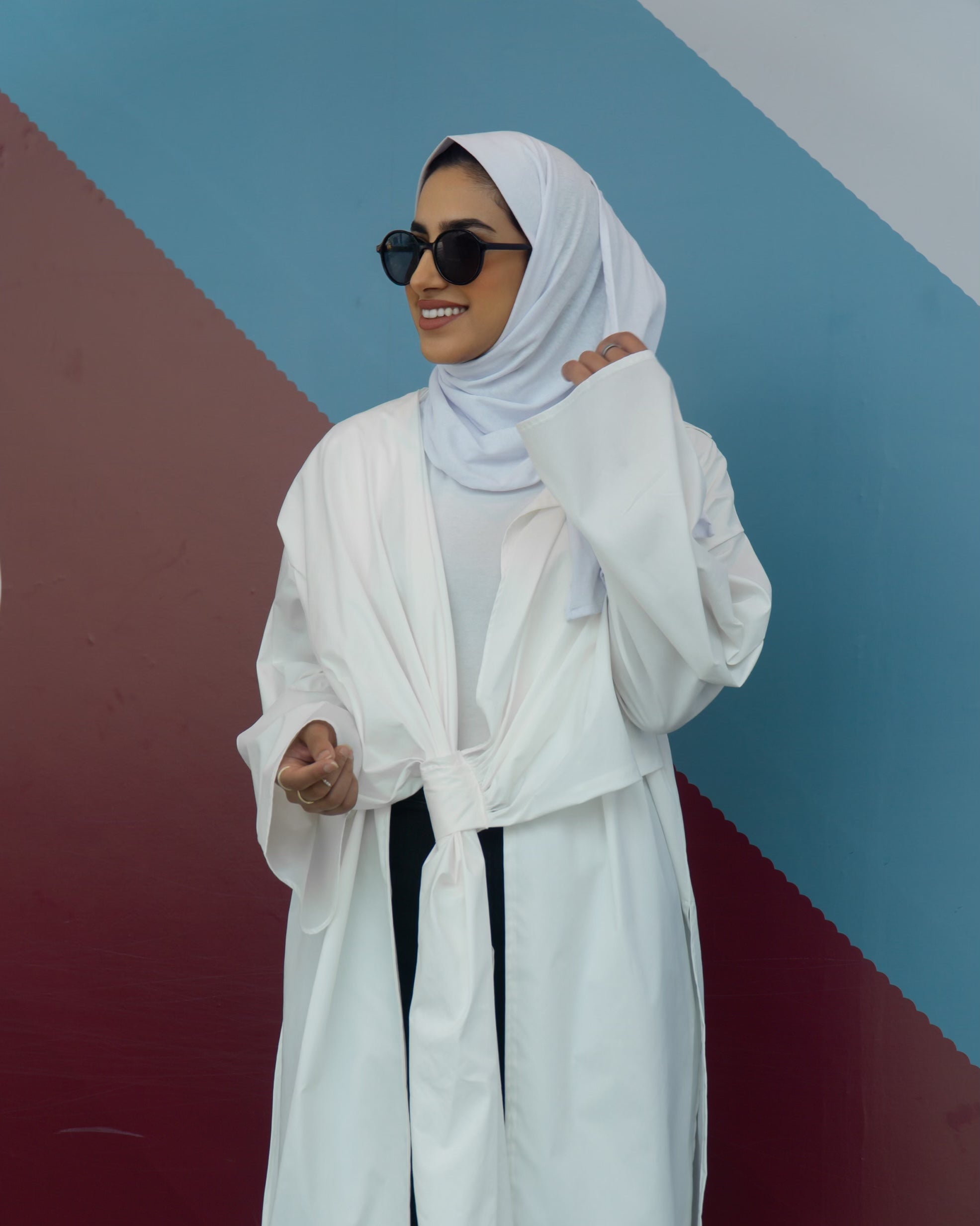 سترة طويلة مربوطة الخصر